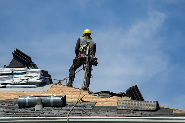 Professional Roof Replacement technician working in Caldwell, KS